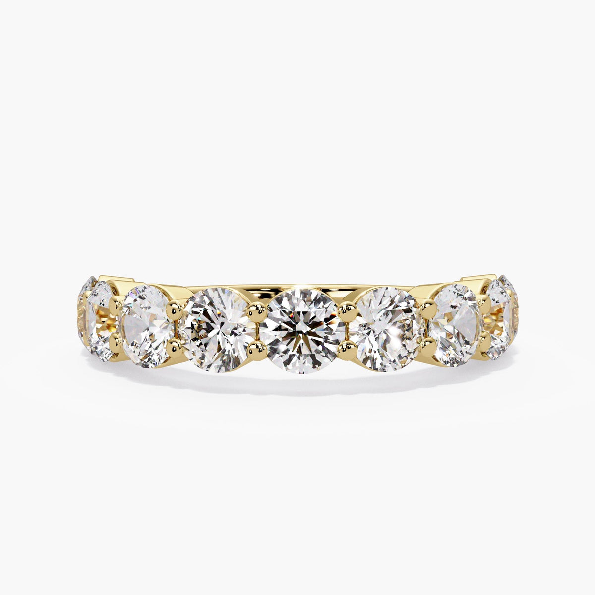 14K yellow gold round lab grown diamond wedding band with nine 4 mm diamonds in a low shared prong setting.