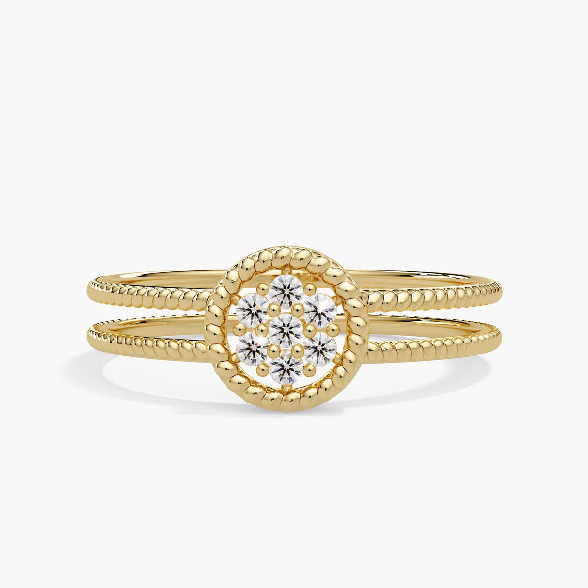 14K yellow gold ring with seven round diamonds set in a beaded halo