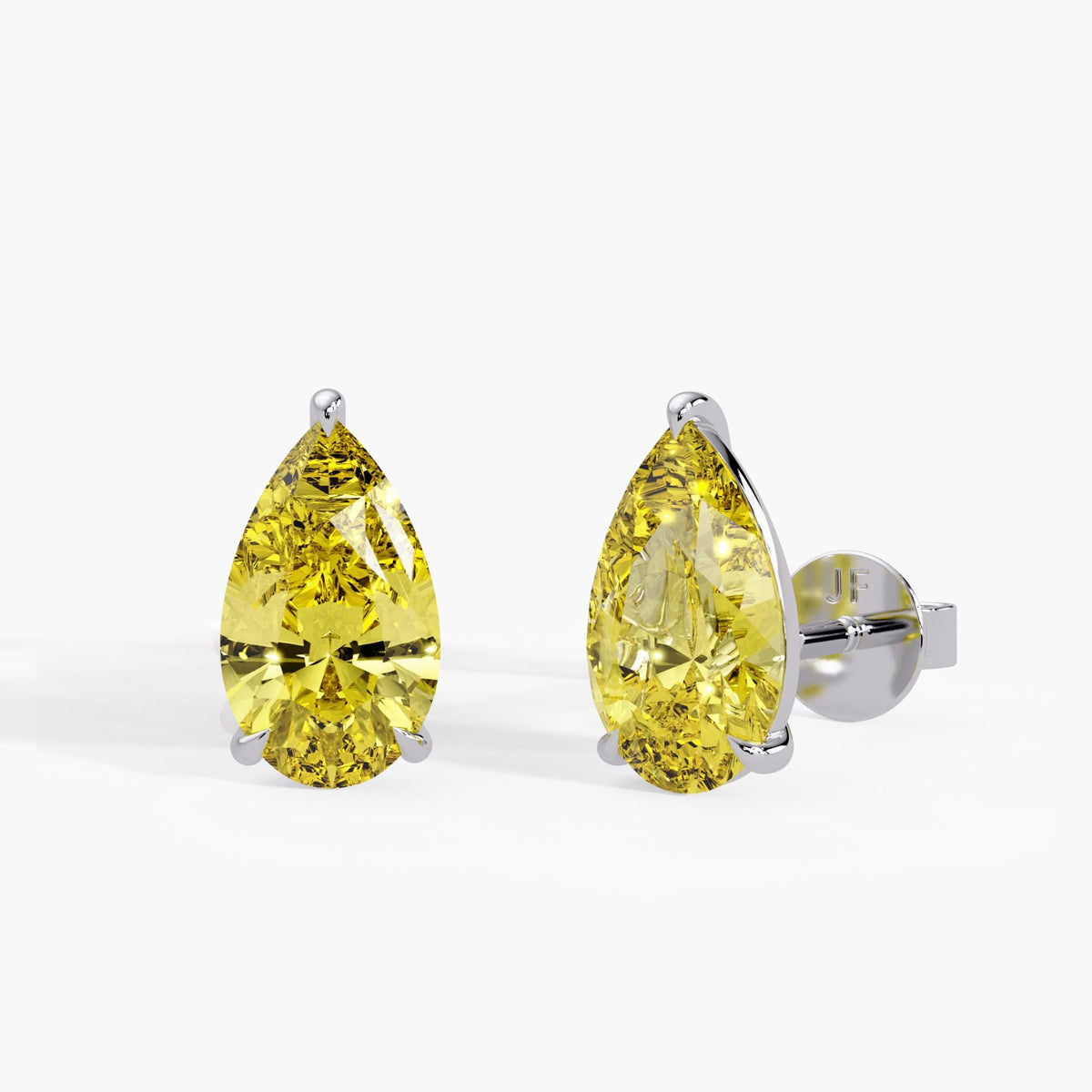 IGI certified fancy yellow lab grown diamond pear stud earrings in solid 14K yellow gold