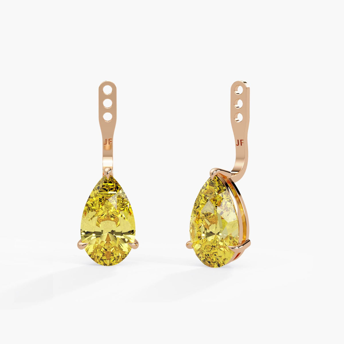 Fancy Intense Yellow pear lab diamond earring jackets in 14K rose gold, with warm polished settings, claw prongs and three adjustable attachment holes.