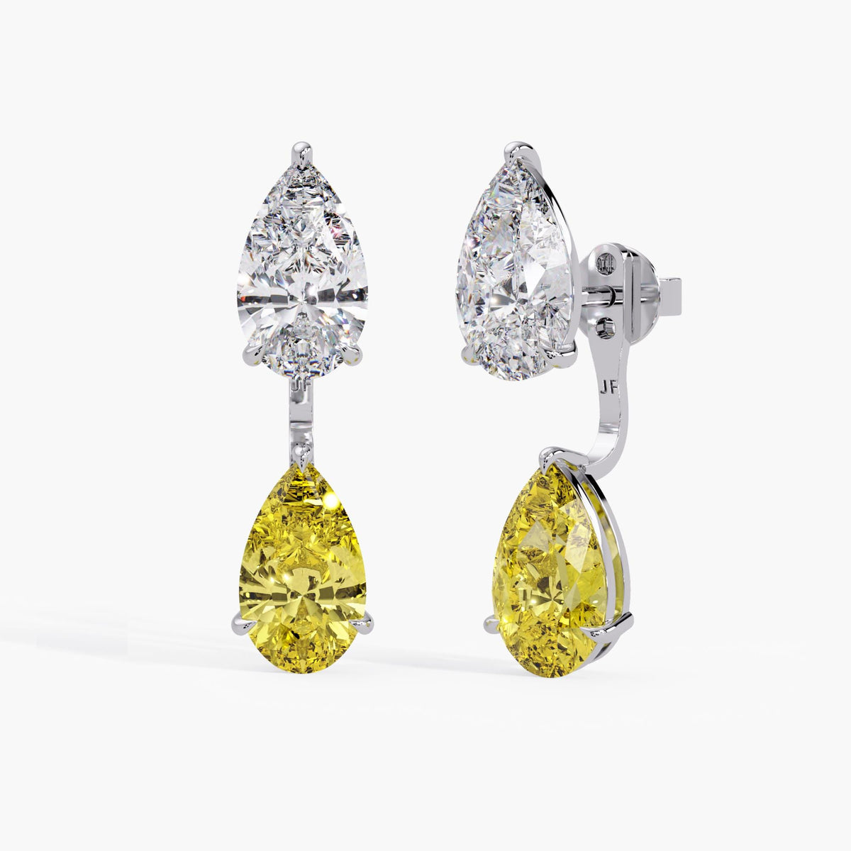 Pear yellow diamond drop jackets in 14K white gold, styled beneath white pear diamond studs for a contrasting double-drop look. Stud earrings are not included.