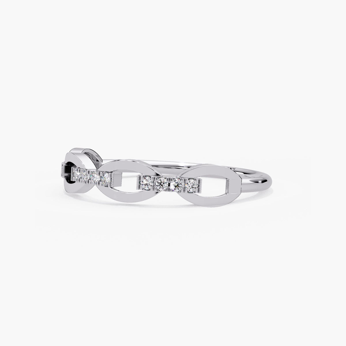 Dainty natural diamond stacking ring in white gold with open oval links and twelve round diamond accents.