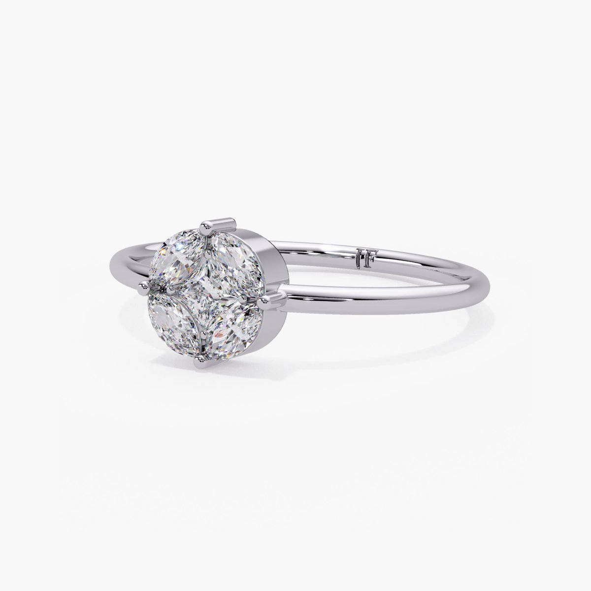 White gold floral engagement ring featuring a geometric five-diamond cluster and a delicate polished band.