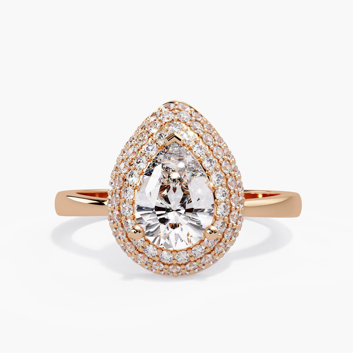 14K rose gold teardrop statement ring with a pear lab grown diamond center, surrounding rows of round pavé diamonds and a polished rose gold band.