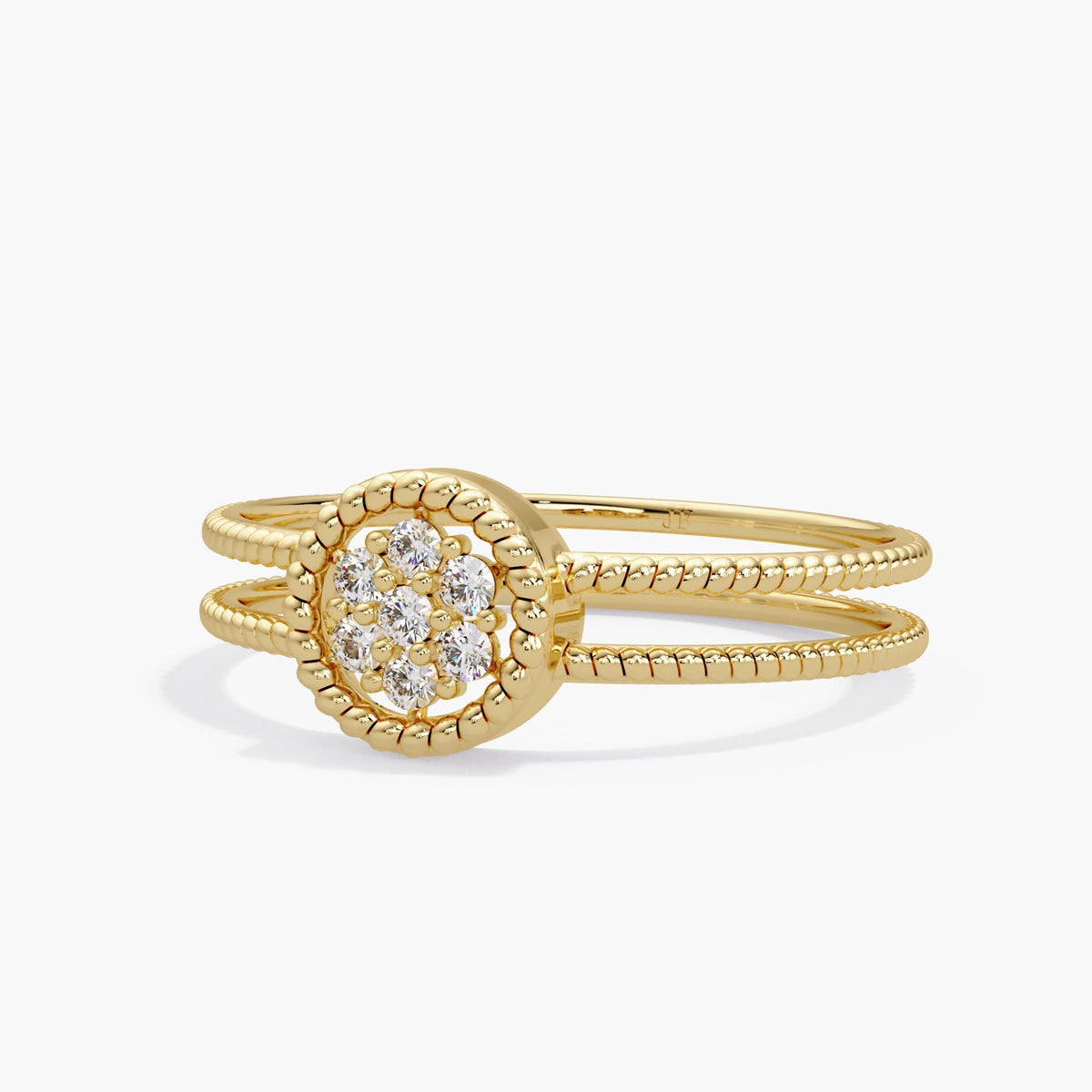14K yellow gold ring with seven round diamonds set in a beaded halo