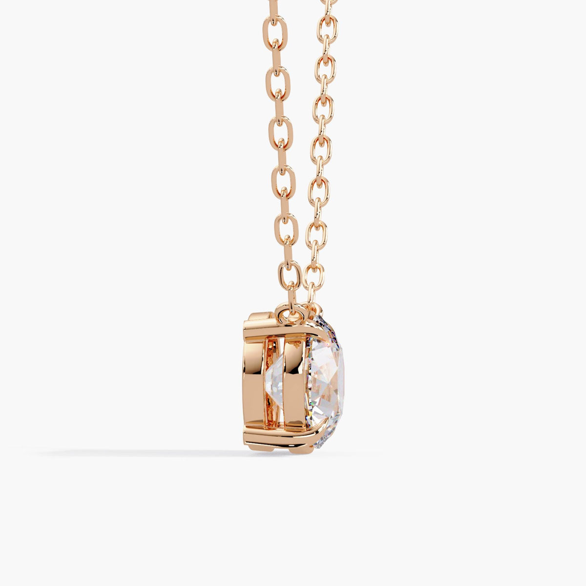 minimalist diamond necklace in 14K solid rose gold, showing a round brilliant lab-created diamond, open basket setting and diamond cut cable chain.